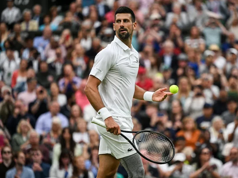 Djokovic shrugs off injury fears to reach Wimbledon second round