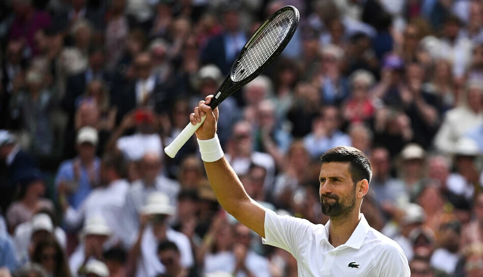 Djokovic into Wimbledon third round after rookie scare