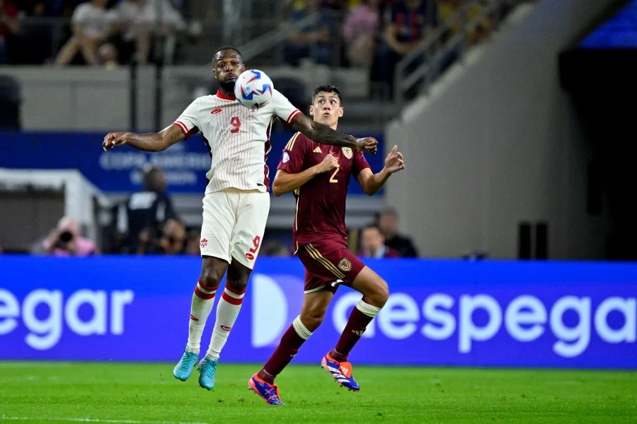 Canada stun Venezuela on penalties to reach Copa semis