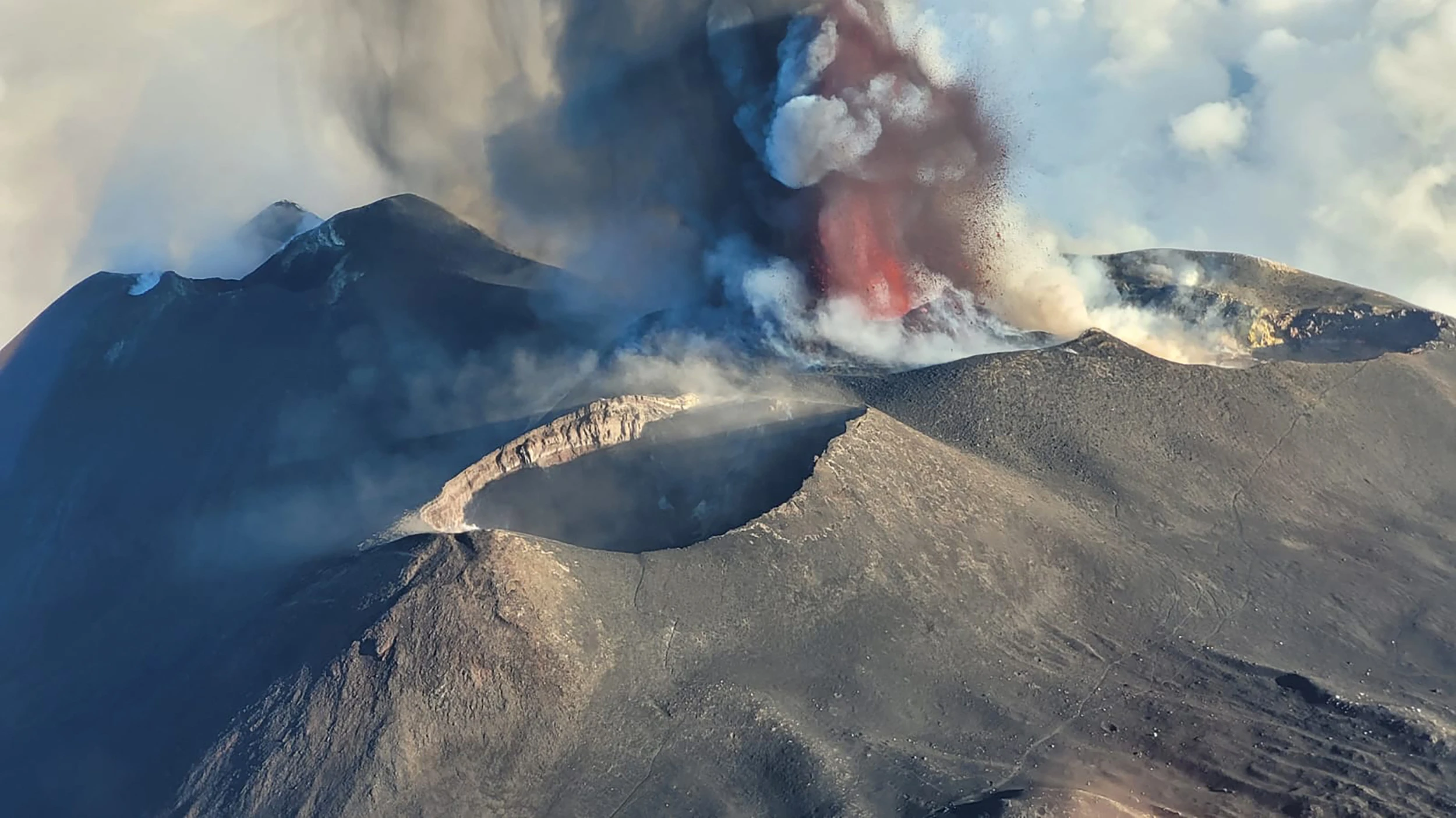 Flights slowly resume at Sicily's Catania airport as volcano erupts