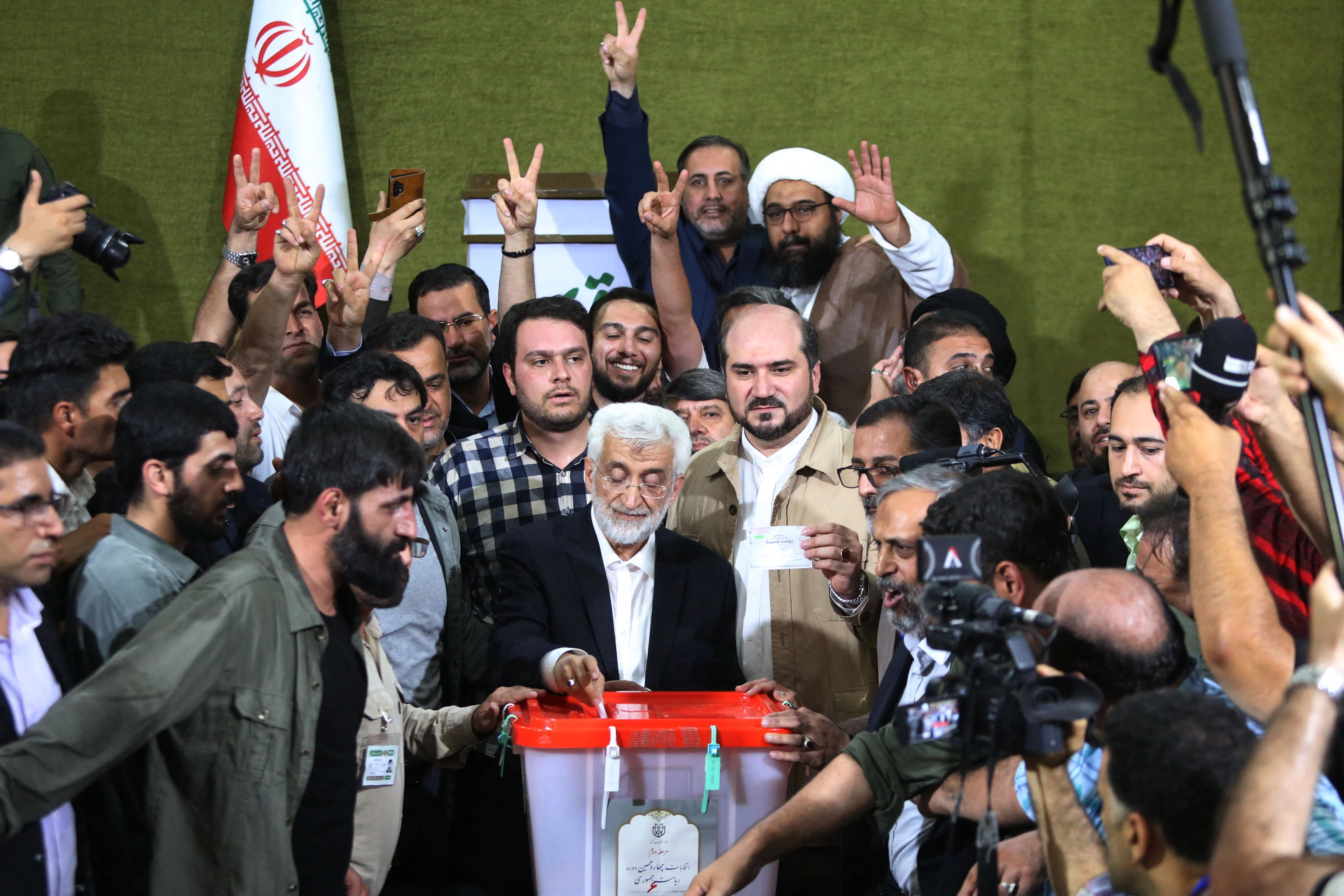 Reformist faces ultraconservative as Iran votes for president