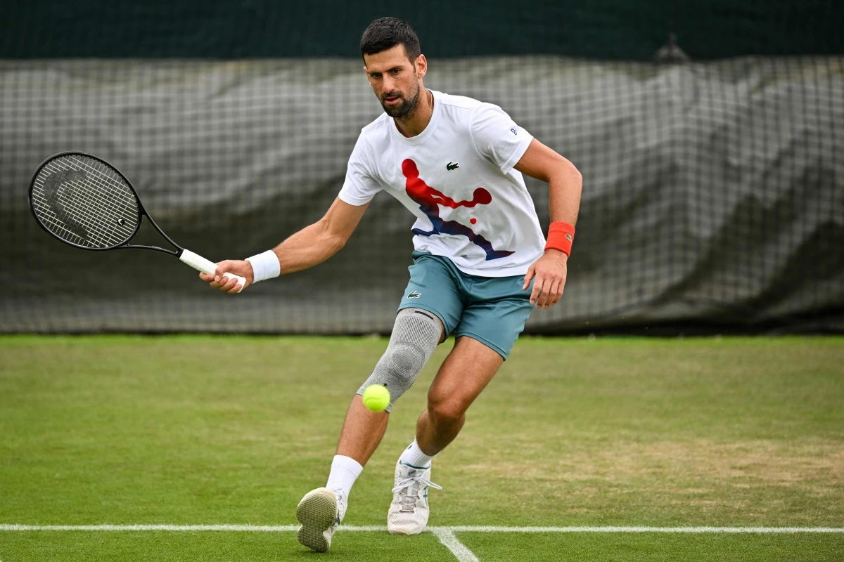 Djokovic gets free pass to Wimbledon semi-finals as Rybakina cruises