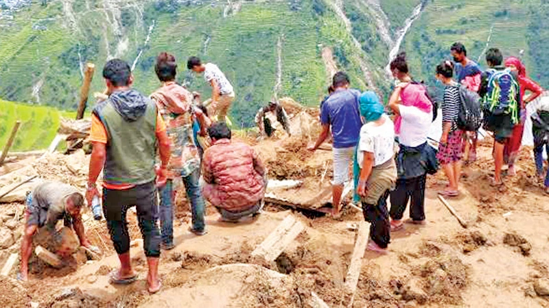 66 missing in Nepal after landslide sweeps two buses into river: district official