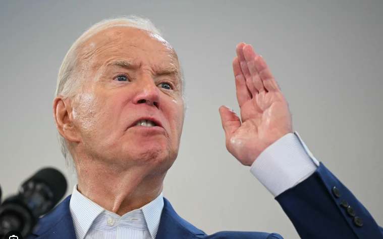 Biden defiant on campaign trail but pressure mounts