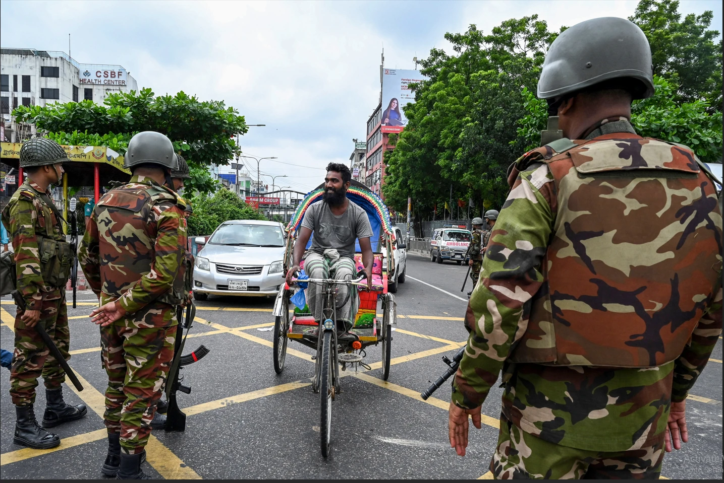 Bangladesh army out in force as police fire on protesters