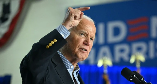 Joe Biden 'absolutely' staying in US presidential race