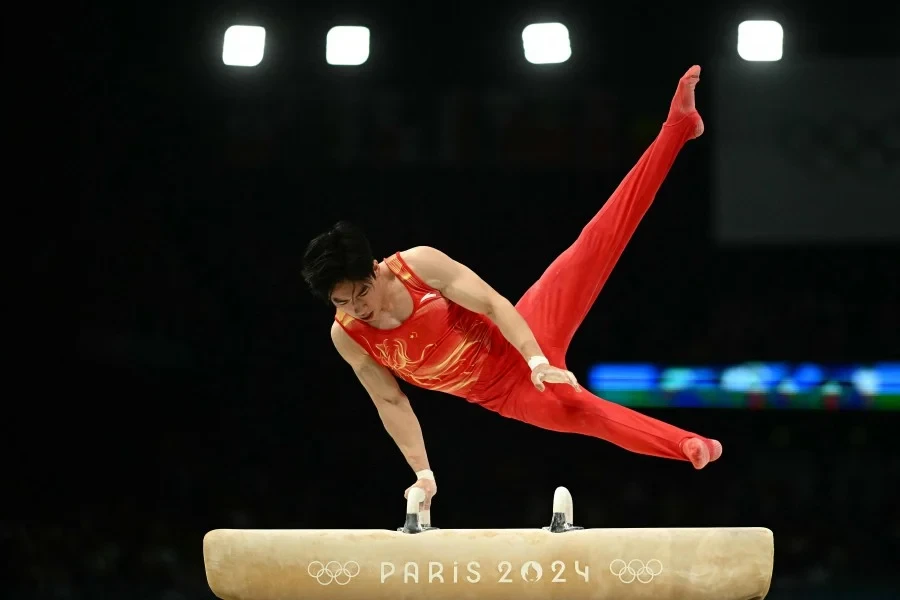 China edge Japan as Olympic gymnastics springs into action