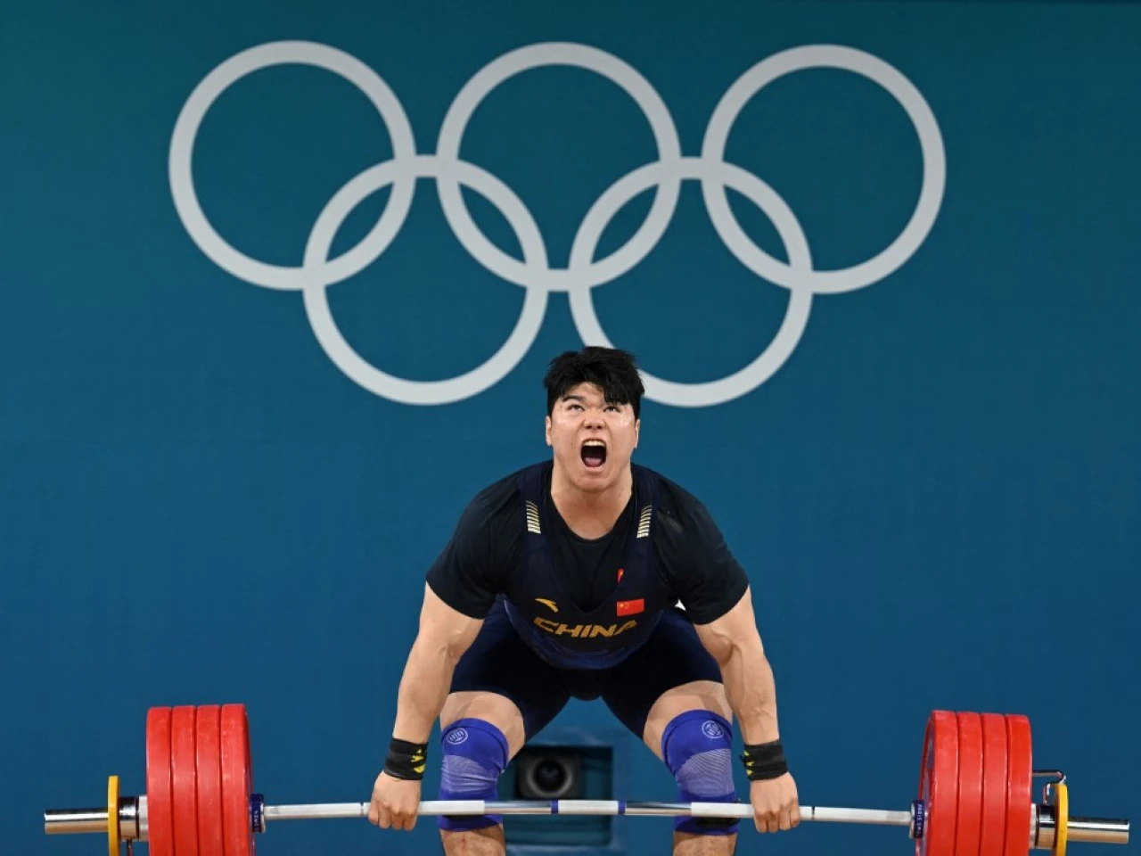 Liu ckinches China's fourth weightlifting gold medal