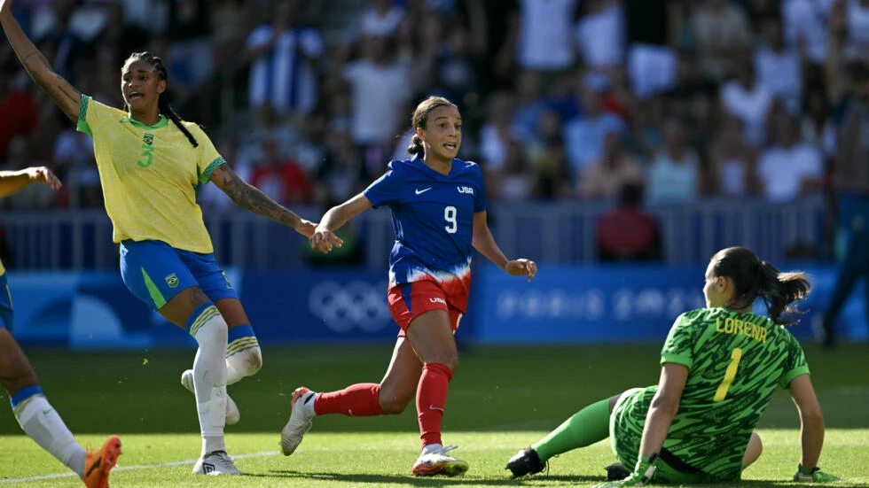 Swanson’s stunning strike helps USA to beat Brazil for women's football gold