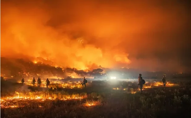 Homes evacuated as wildfires engulf southern French town