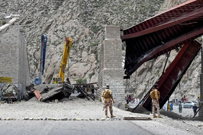 Pakistan railway track hangs off bridge after attacks