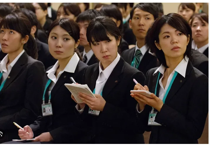 Japan scraps idea to woo women out of city with cash