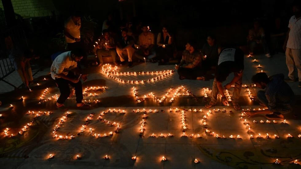 Indians demand justice in candlelight march for murdered doctor