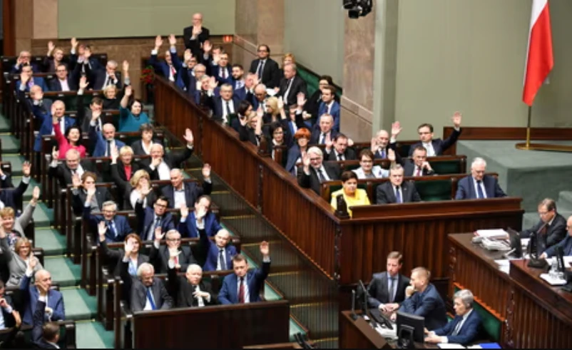 Polish lawmakers adopt legislation to reform controversial constitutional court