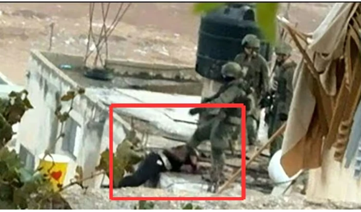 Footage shows Israeli soldier pushing body off roof in West Bank raid