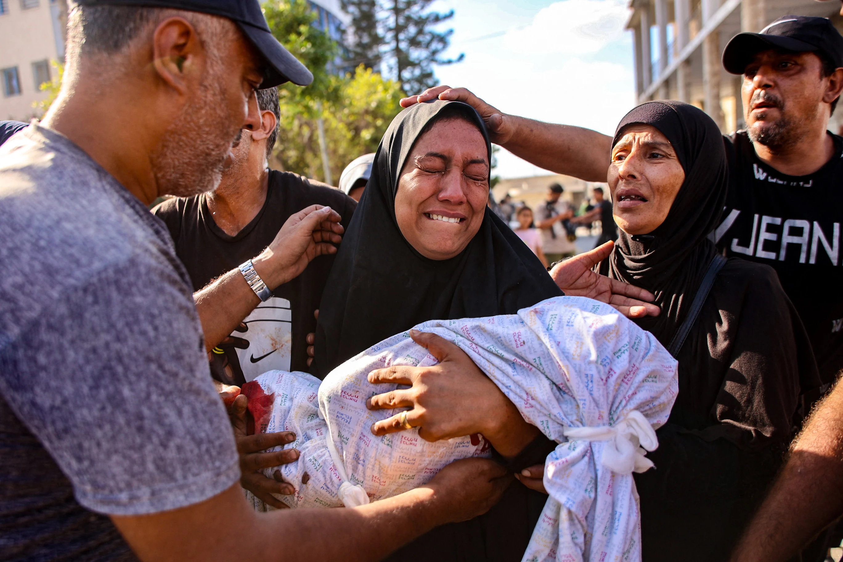 Israel air strikes at school shelter kill 21 including 13 orphans, six woman