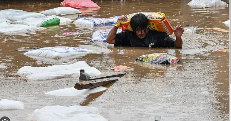 Nepal surveys flood wreckage as death toll reaches 198