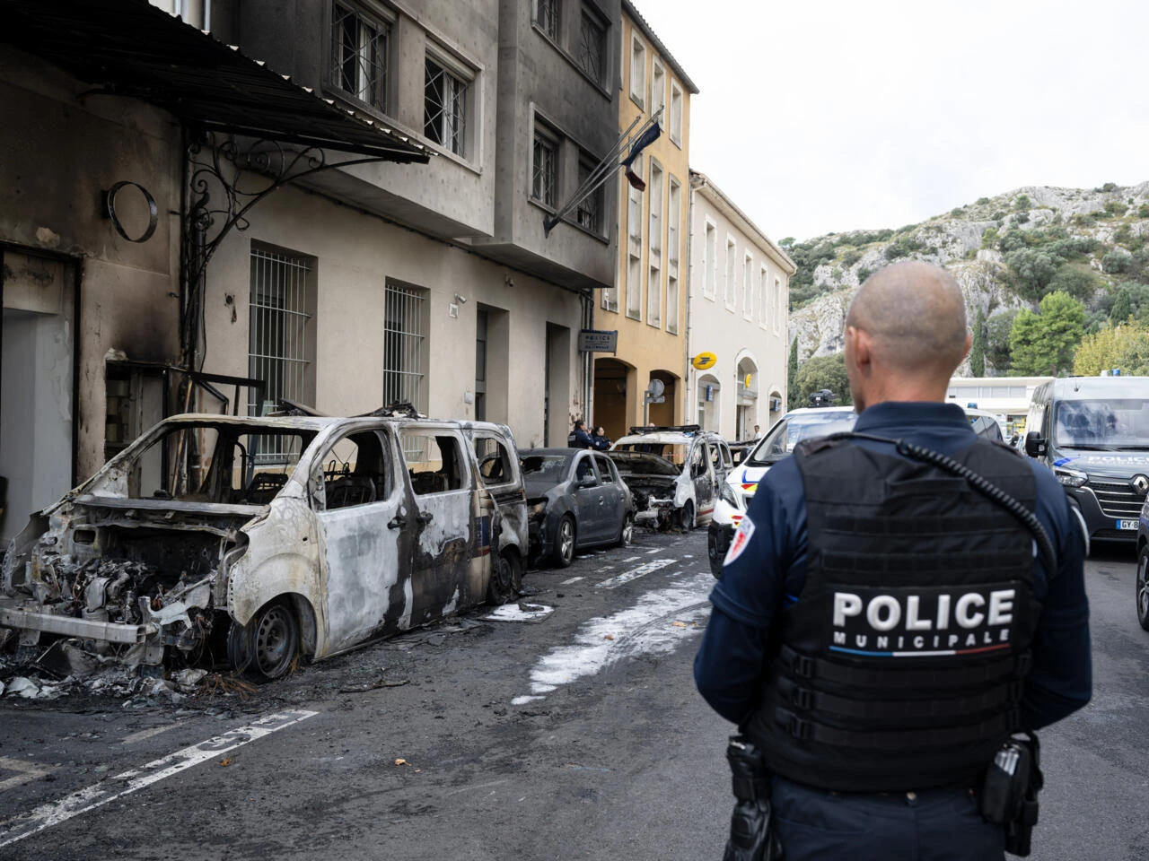 France vows tougher action on drug crime after police vehicles set ablaze