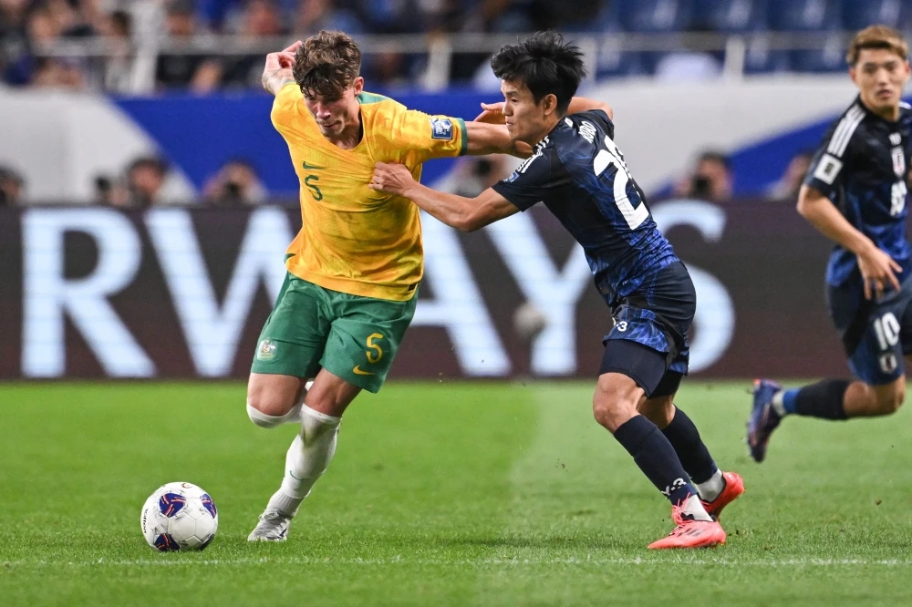 Japan hold Australia, S. Korea and China win in World Cup qualifying