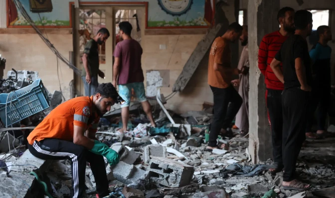 Gaza hospitals say 14 killed in Israeli strike on school-turned-shelter