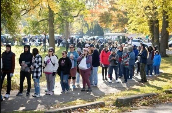 Harris and Trump hit Michigan as early voting surges in pivotal race