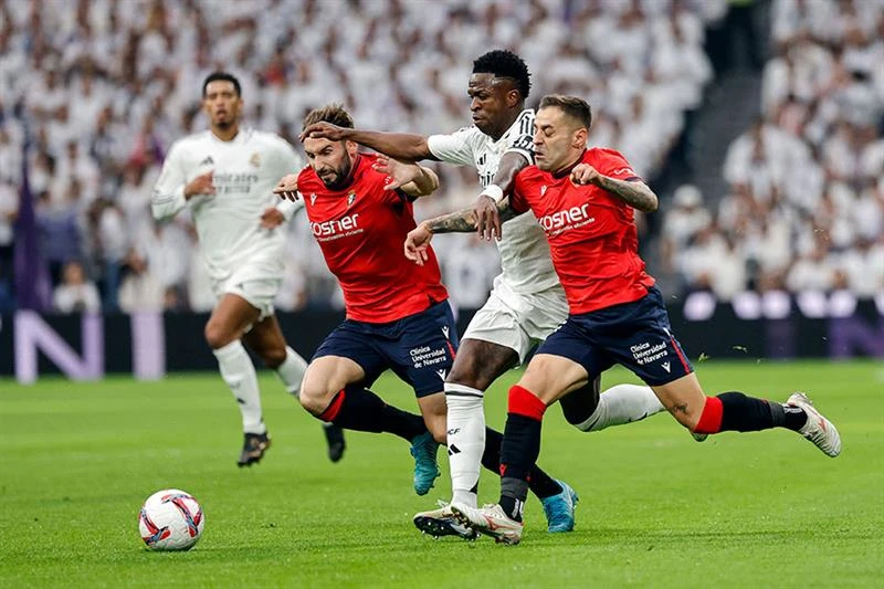 Vinicius hat-trick powers Real Madrid to crush Osasuna