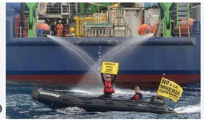 Greenpeace activists board tanker in plastic protest