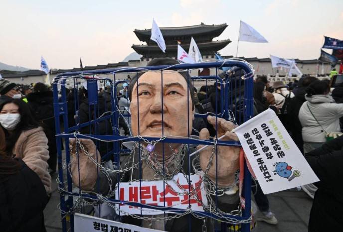 Impeached South Korean president defies Christmas summons