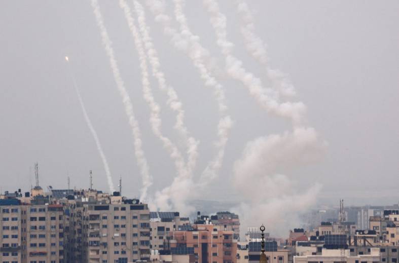 Rockets fired from Gaza as Israeli strikes kill 12, rescuers say