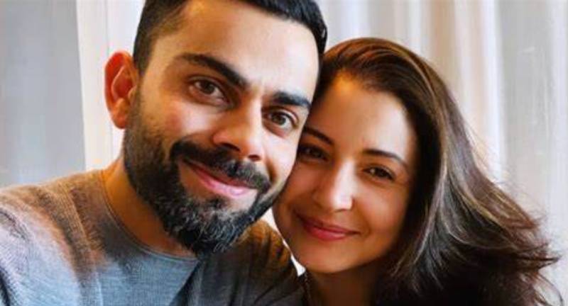 Viral: Virat and Anushka visit spiritual leader with kids