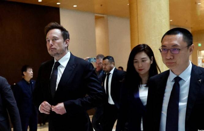 Top China official urges Musk to deepen ties with Beijing