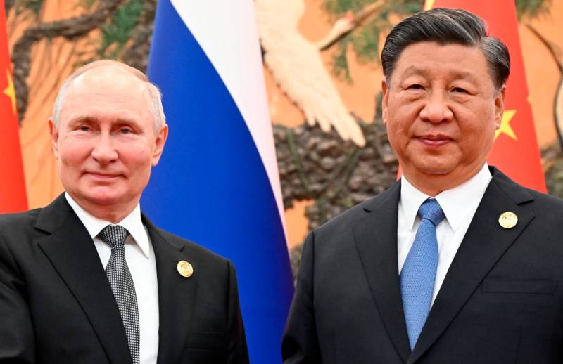  Putin and Xi praise ties, hours after Trump sworn in