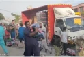 Coca-Cola truck looted after accident in Faisalabad